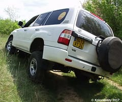 Overland Driving Tips: rear wheel lifting from terrain, next stage is a rollover
