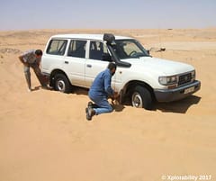 Avoid the 'Digging Club' while driving in sand, read tips and techniques.