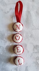 completed bottle cap ornament