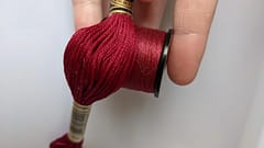 Anchor spool vs DMC skein red