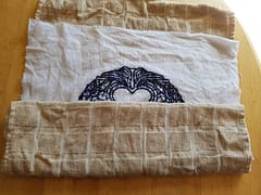 roll in towel washed cross stitch