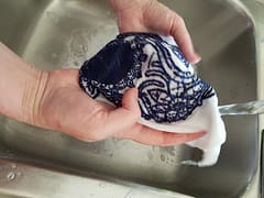 rinsing water out of cross stitch